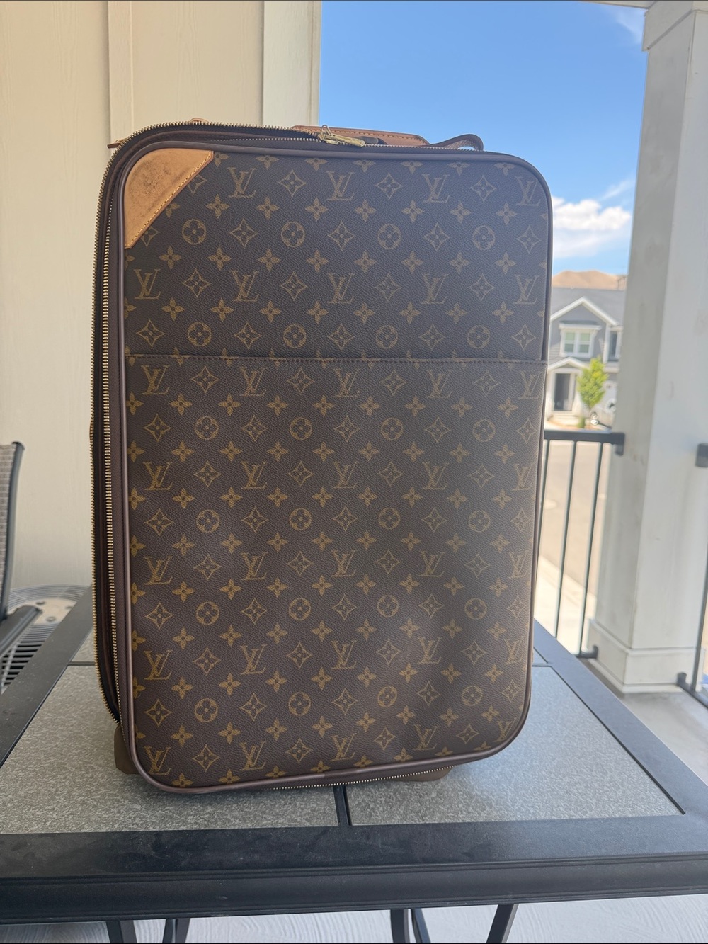 Louis Vuitton Monogram Rolling Carry-On in Brown and Tan